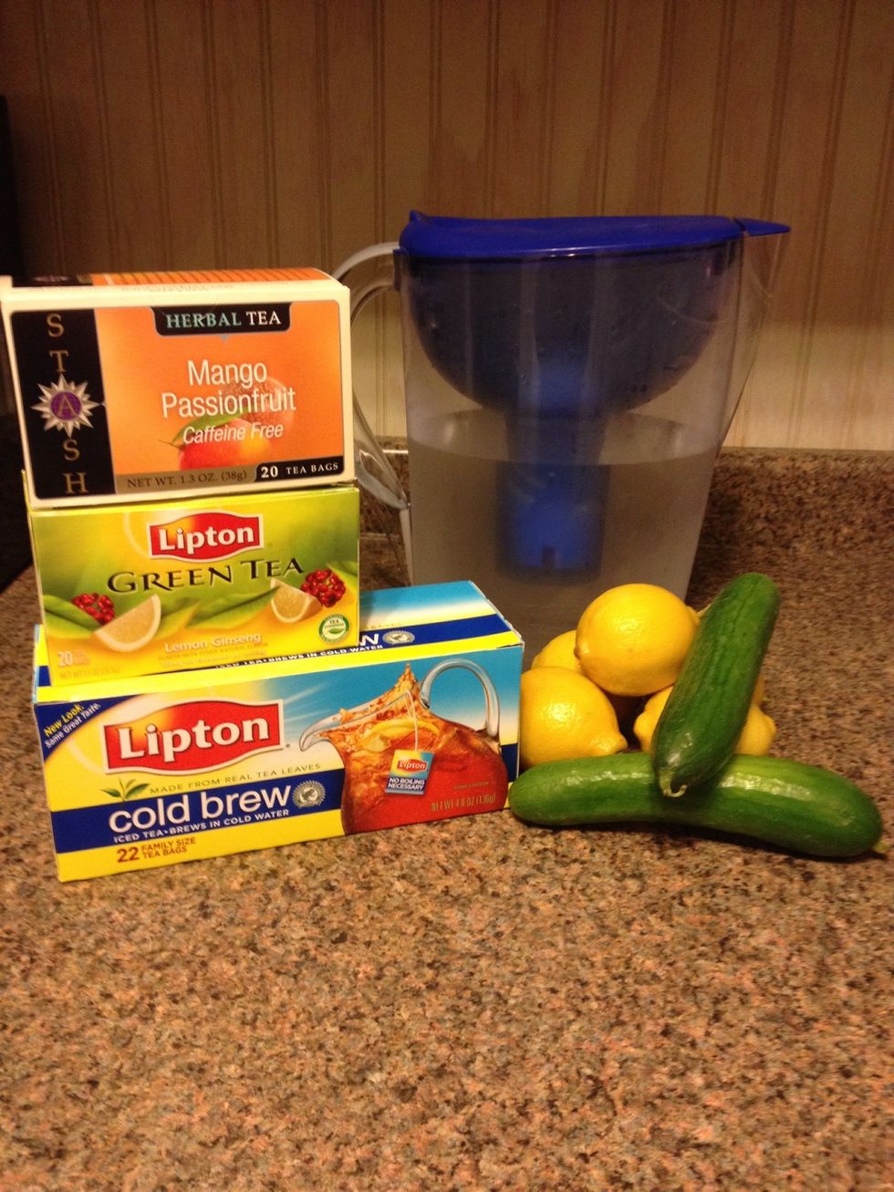 Clean lemons & cucumbers. Cut detoxifying lemons & remove seeds then cut hydrating cucumbers. Add then to container w/Lipton Cold Brew Tea Bag, Green Tea Bag & Flavored Tea Bag of Choice.