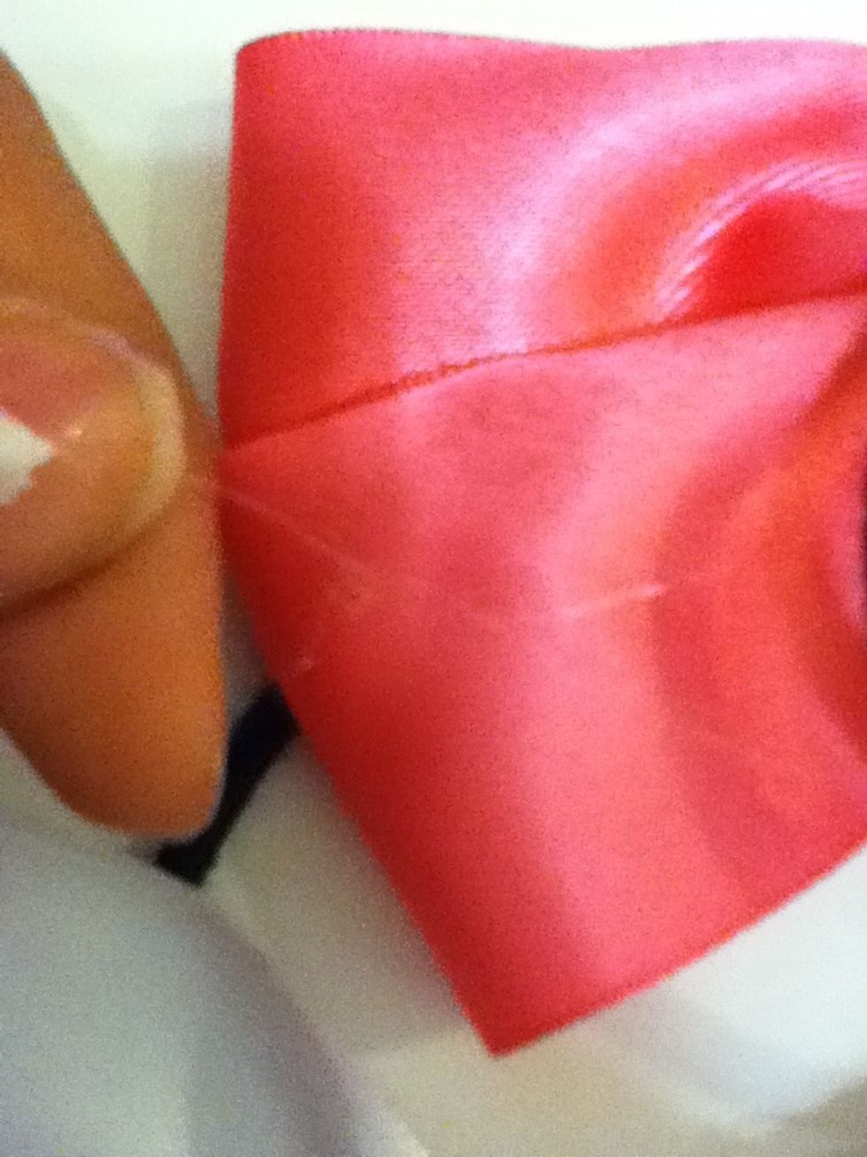 Clean off the hot glue strings