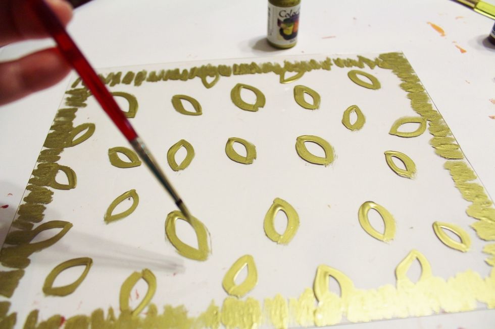 clean Plate and use paintbrush and Gold Ink to create leaf designs on Plate...