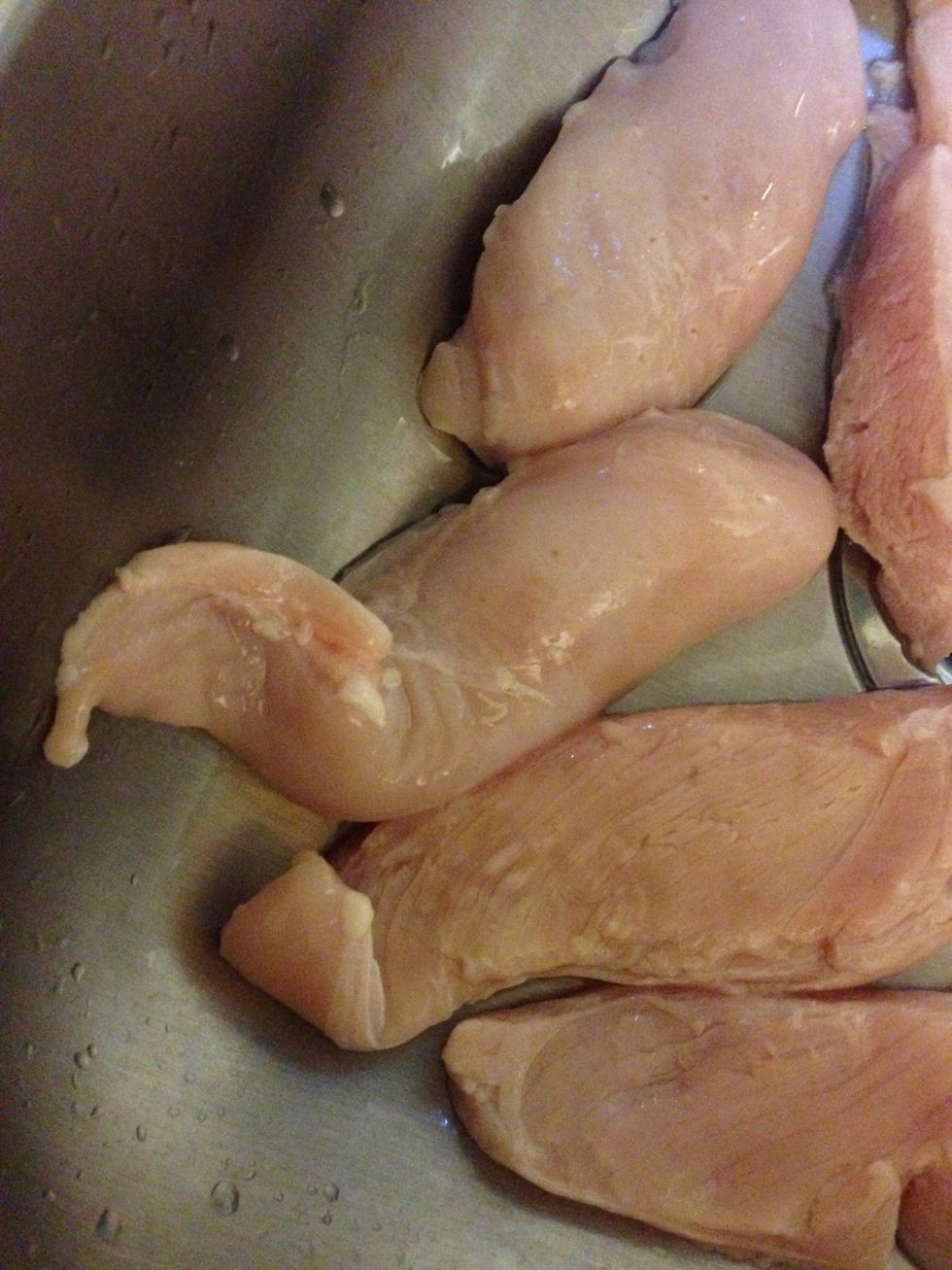 Clean & rinse chicken. Cut each piece in half, the long way.