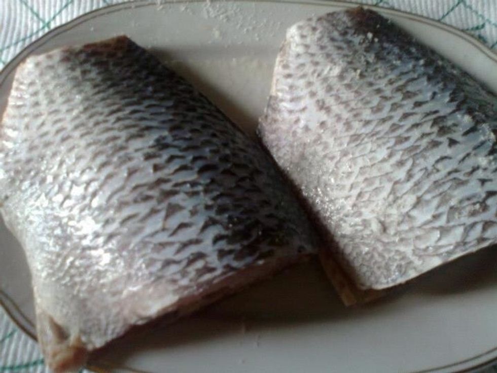 Clean the fish well and add salt on both sides