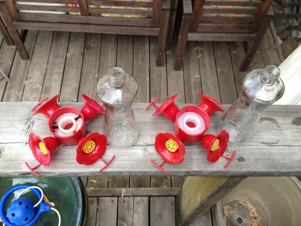 Clean the hummingbird feeder and rinse really well. Make sure there is no soap residue.