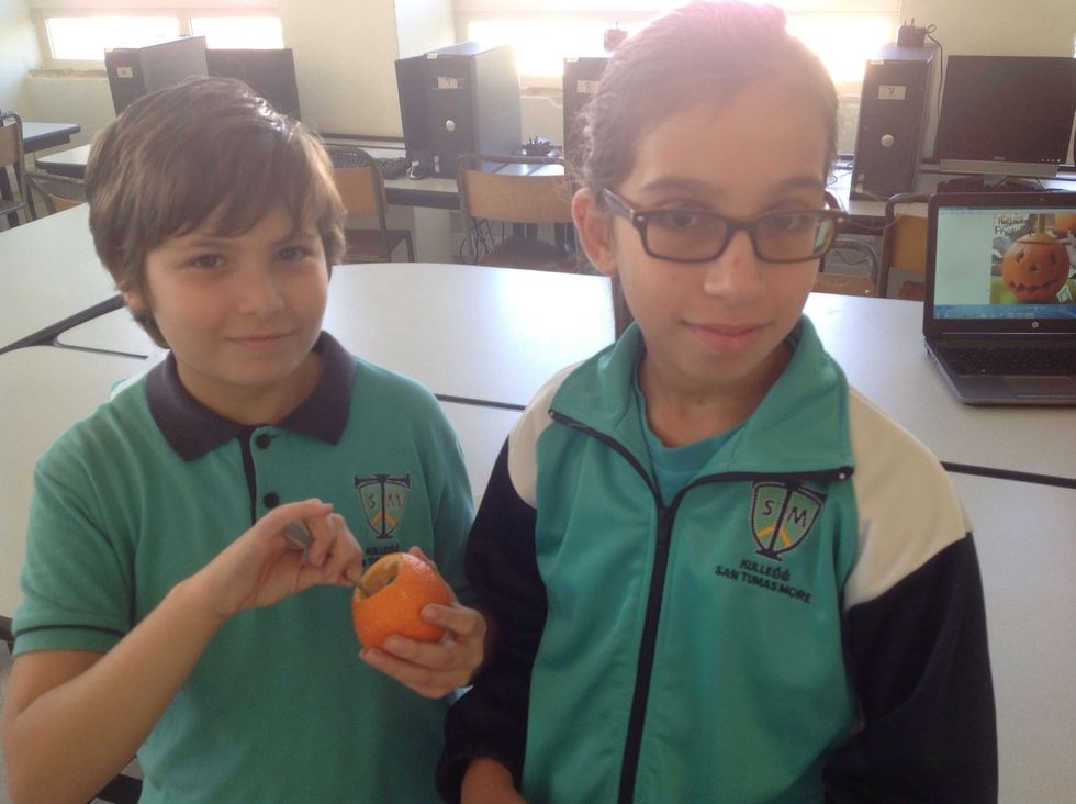 Clean the inside of the orange.
