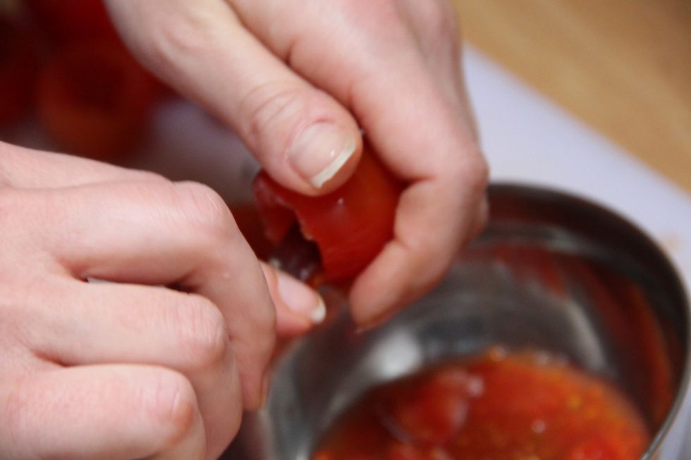Clean the inside of the tomatoes and don't throw it away and keep in bowl