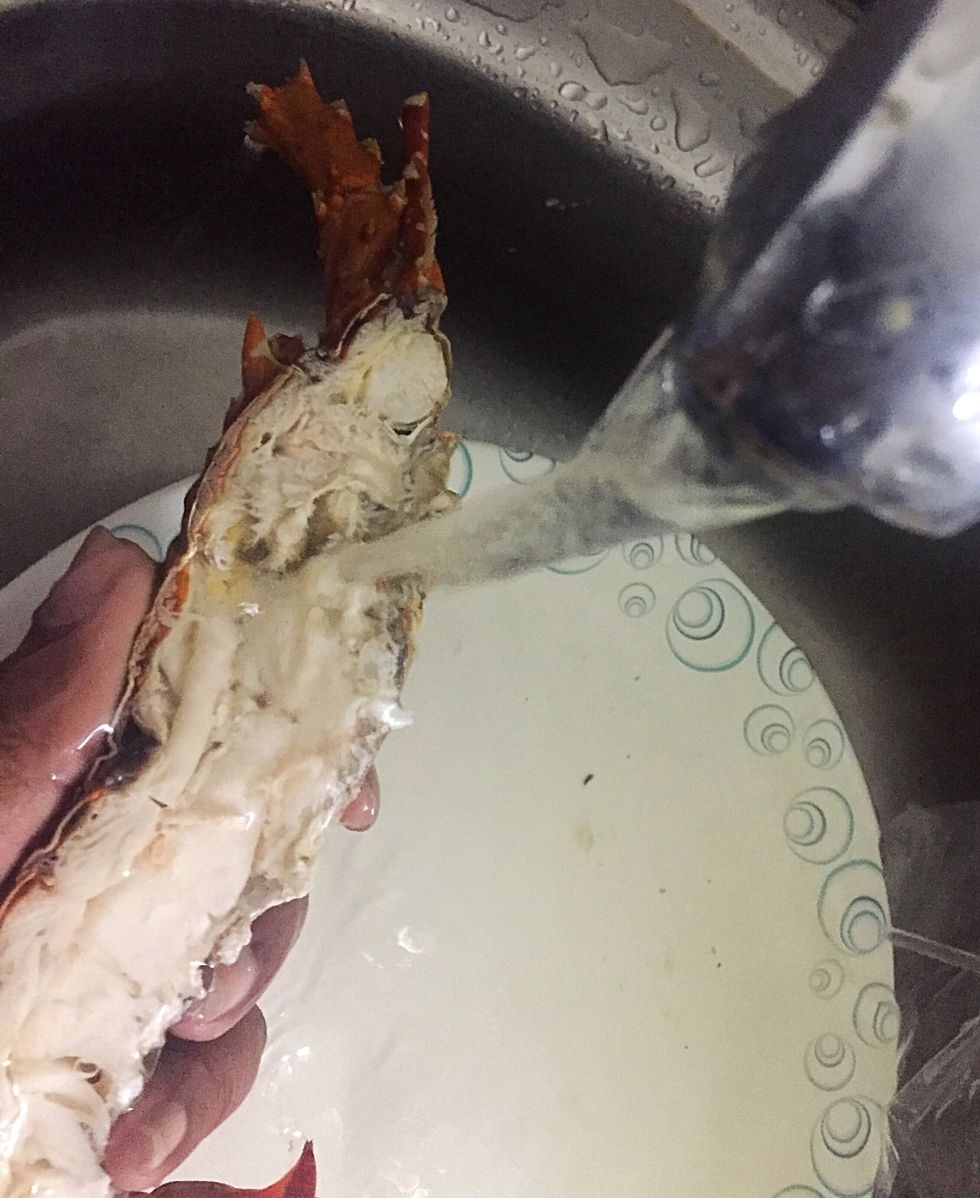 Clean the lobster in running water thoroughly to leave only white flesh inside the shell