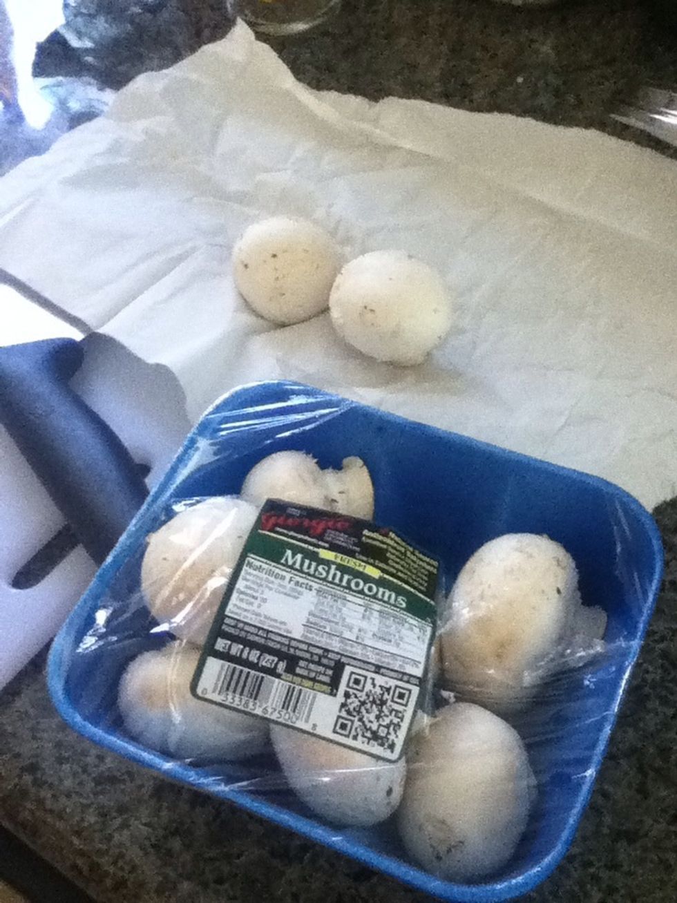 Clean the mushrooms! It's better not to wash them (unless its really dirty then i'd wash it real quick) because they absorb water, so just use paper towel and gently wipe each mushrooms :)