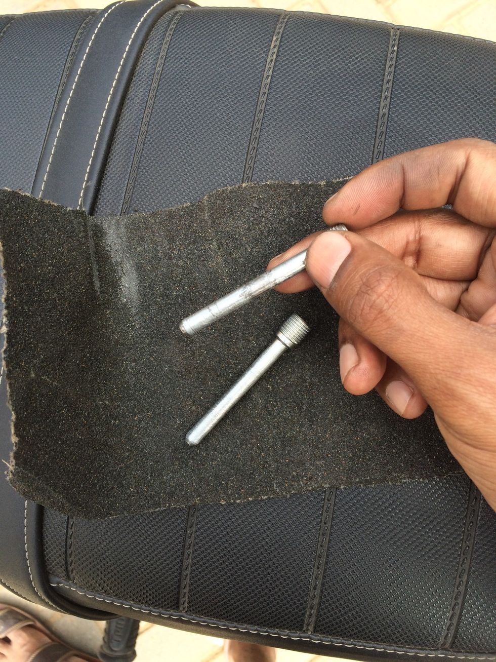 Clean the retaining pins with a smooth to medium sand paper