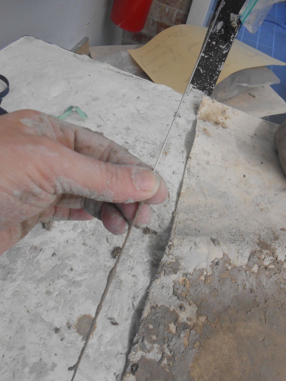 Clean the wire of remaining clay from prior use