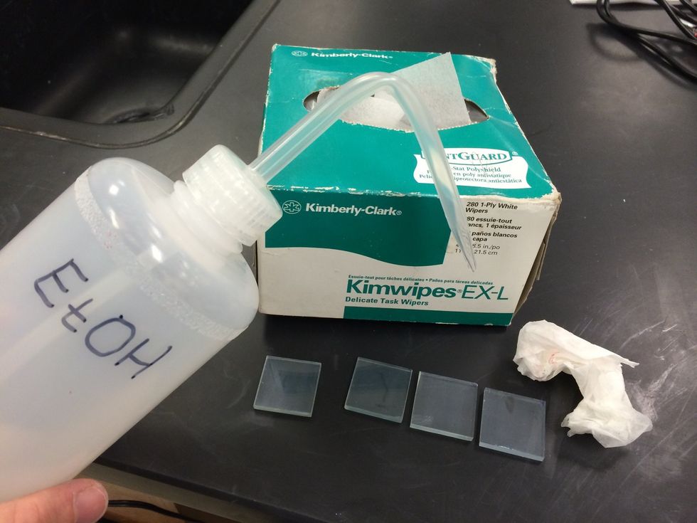 Clean two glass conductive plates by rinsing them in ethanol and then drying them with a soft tissue.