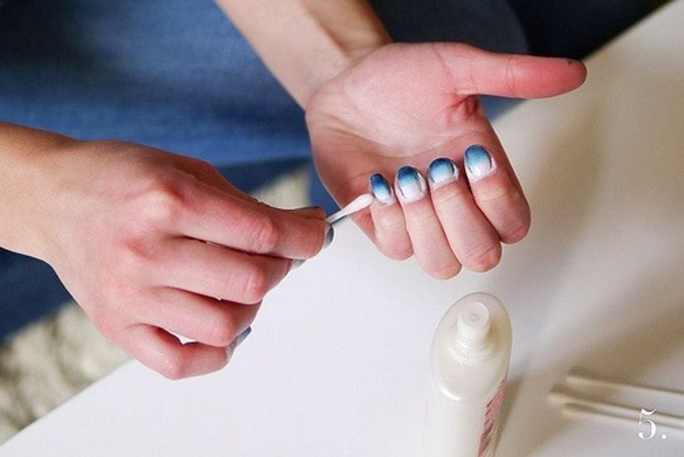 Clean up the sides of you nails with some nail polish remover.