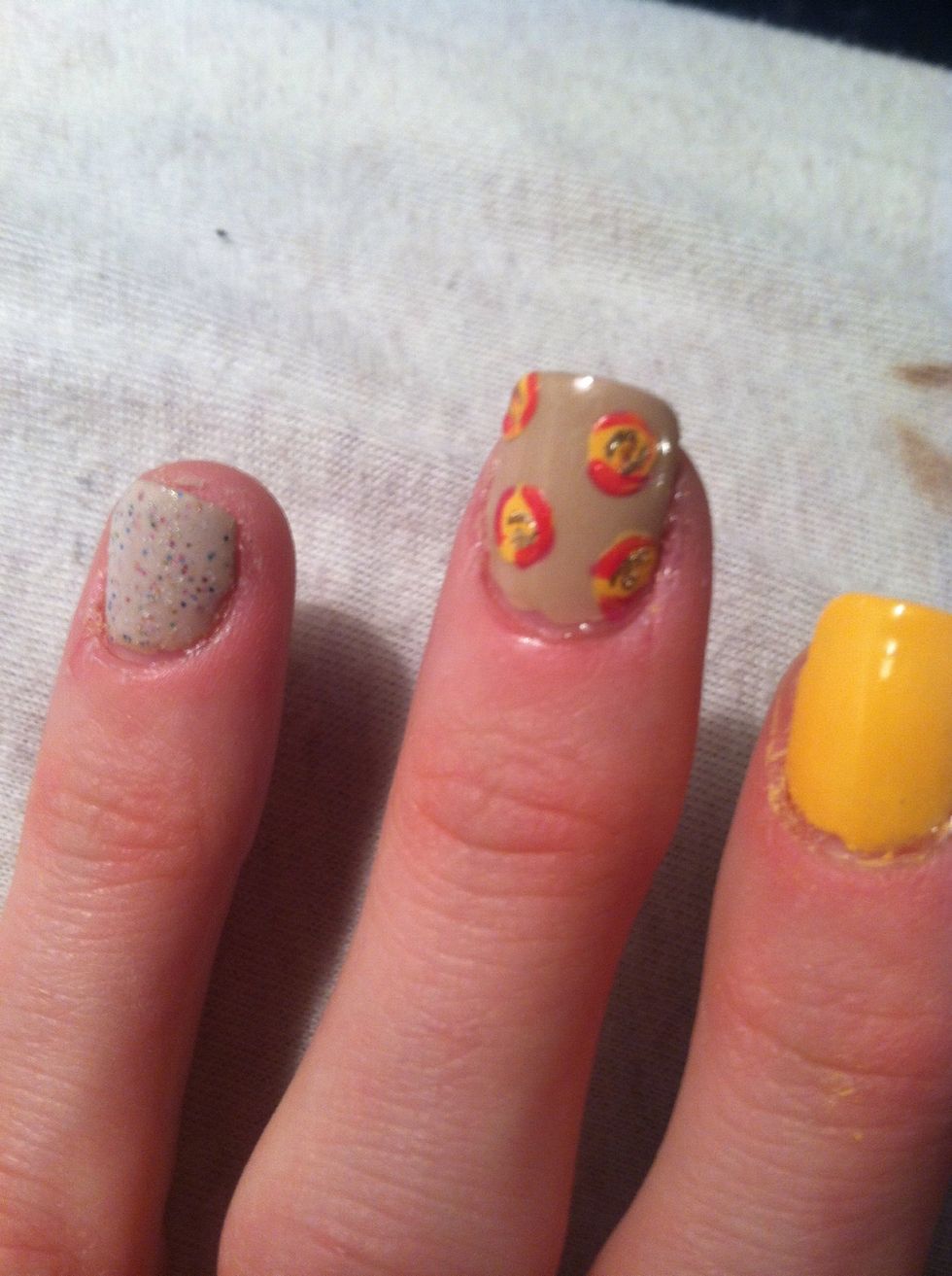 Clean your brush and then add in some half circles and accents around your rose. (I'm using China Glaze's Strawberry Fields)