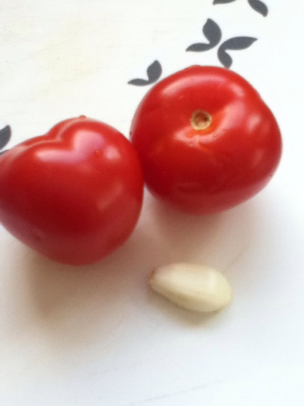 Clean your garlic and tomatoes