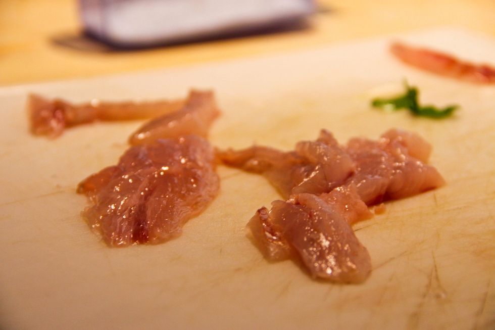 Clean your sea bass checking that no bones are left. Pass your hand over this fish to feel the bones