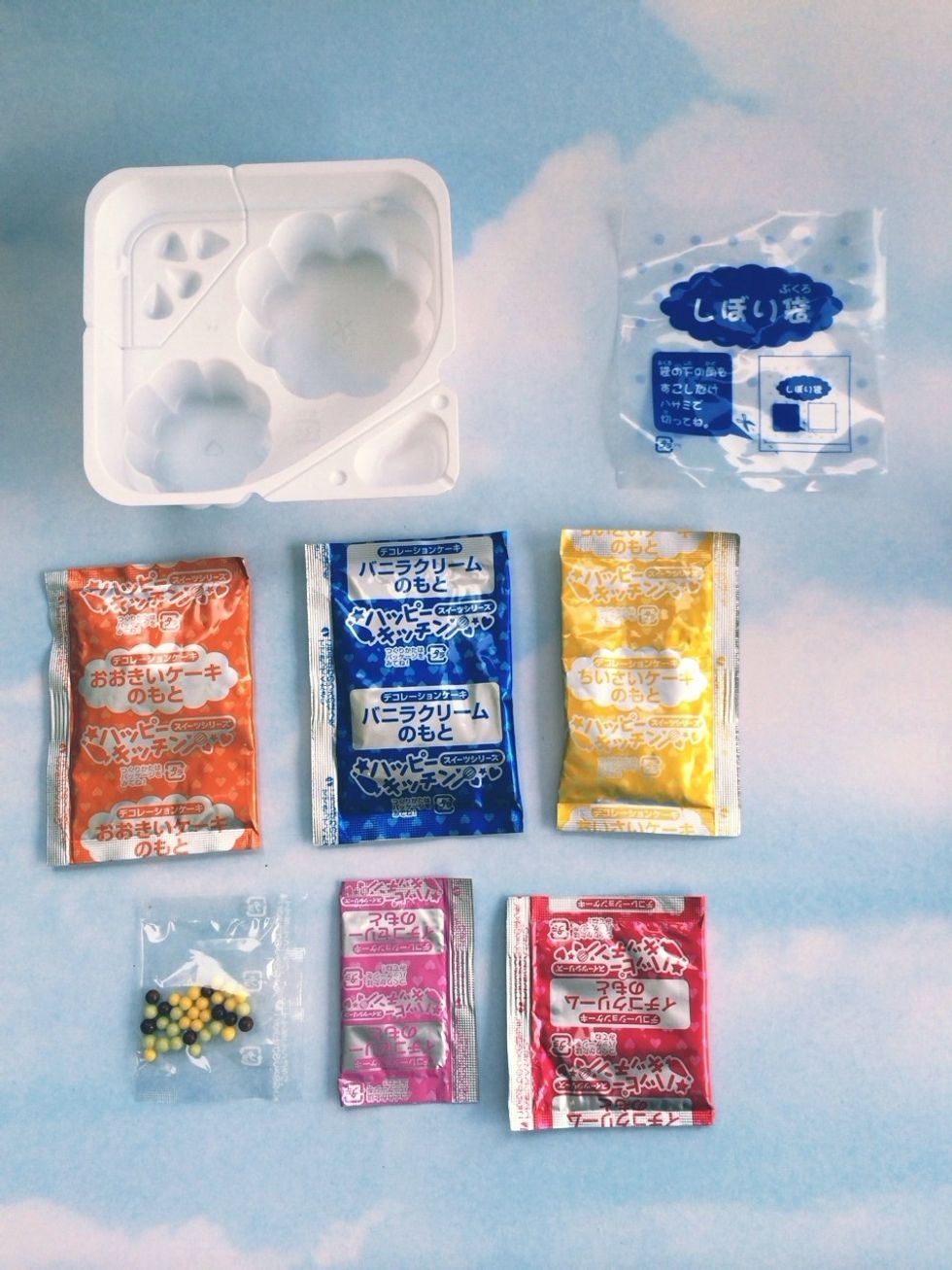 Clear Pastry Bag-ORANGE Pack#1 Cake Mix for Larger Cake-BLUE Pack#2 Mix for Vanilla Frost-YELLOW Pack#3 Cake Mix for Small Cake-RED Pack#4 Pink Deco Frost-PINK Pack#5 Berry Mix-Flavored Sprinkle Deco
