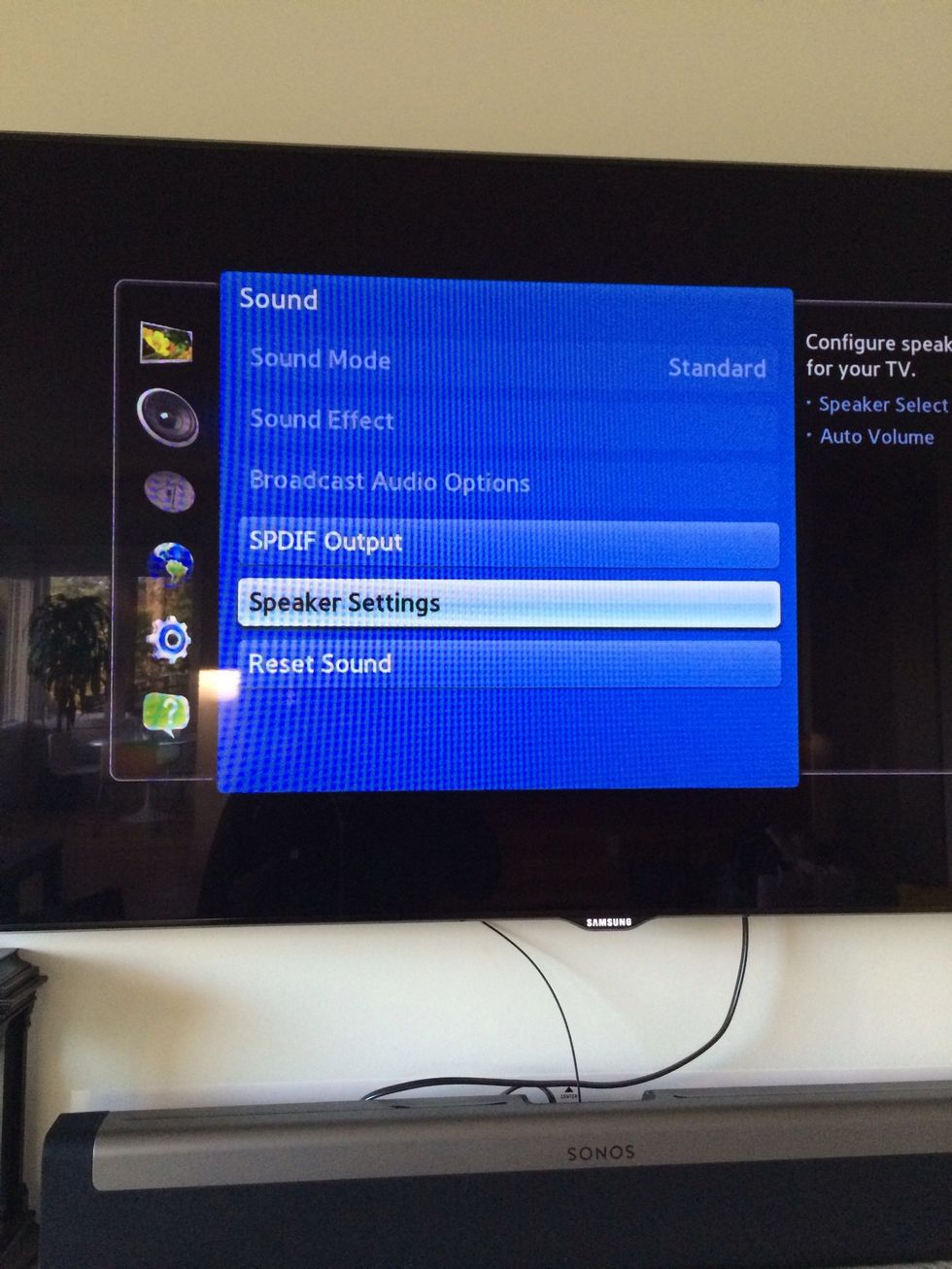 Click center button between arrows to select speaker settings