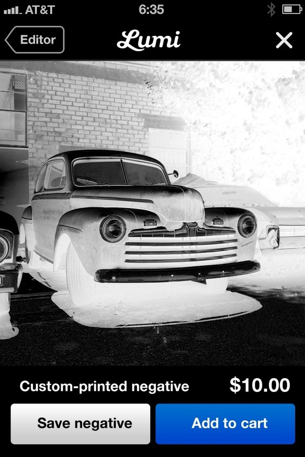 Click NEGATIVE in the top right corner to convert your image to a negative. Save the image to your phone or buy a 12x12" negative directly from the app that will ship to your doorstep.