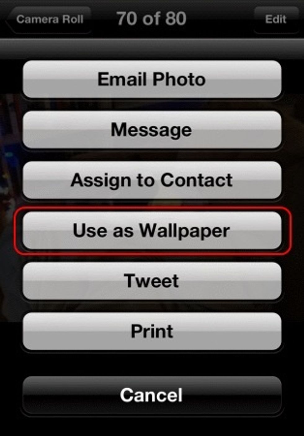 Click the button in the upper right corner with the arrow coming out of the box, and press "use as wallpaper"
