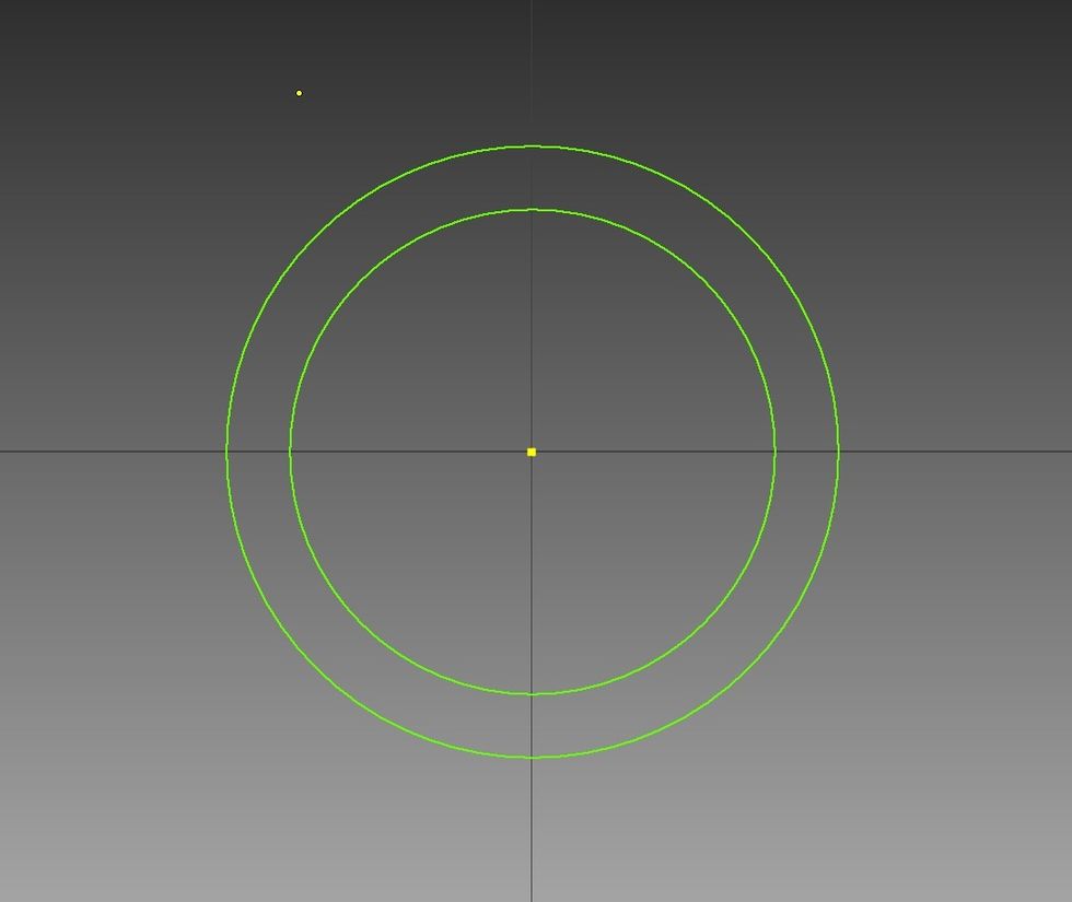 Click the center and create two circles by clicking, dragging, and clicking again when the circle is the right size. One circle should be larger than the other
