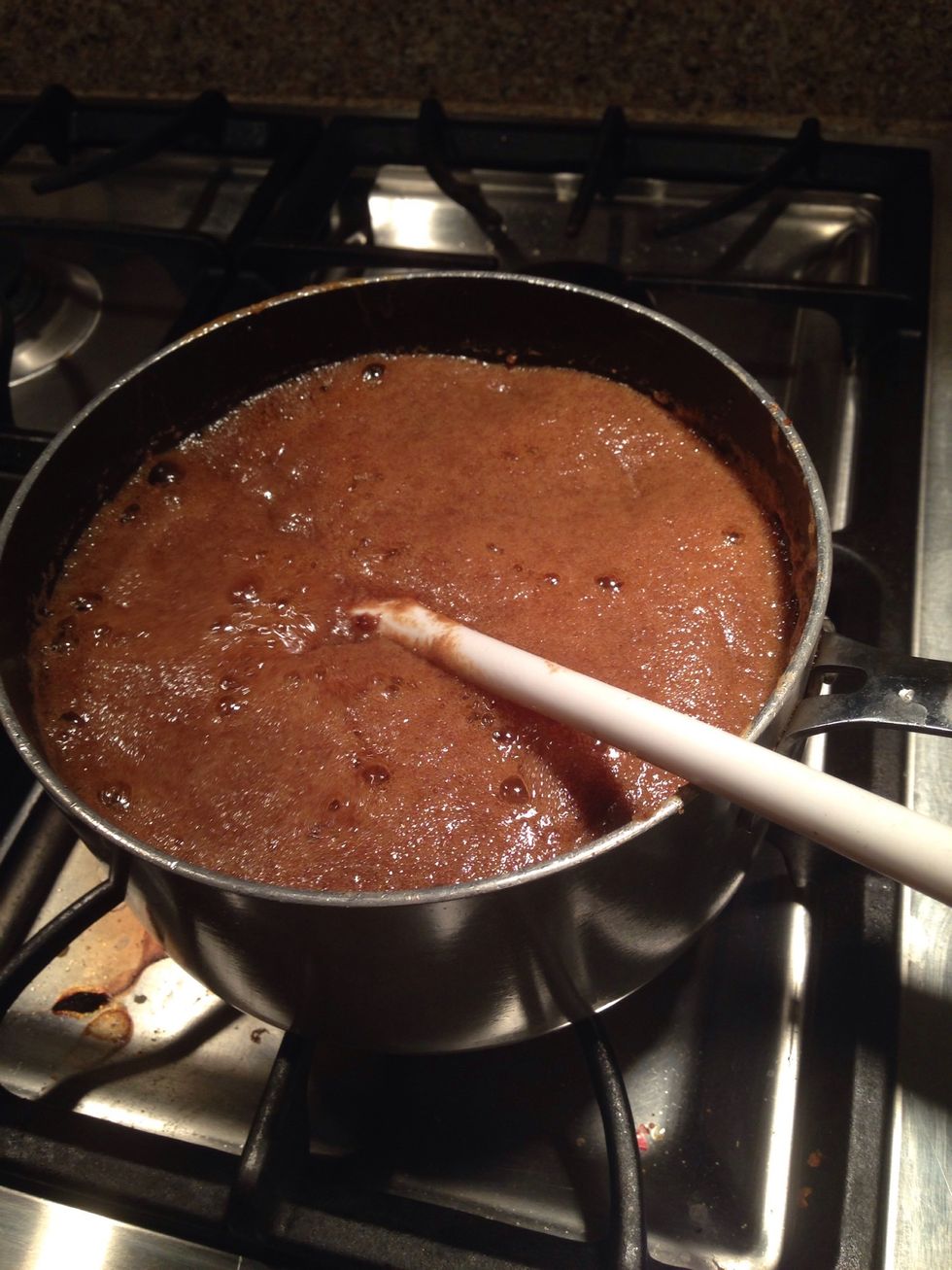 Clip a candy thermometer to the side. Reduce heat to medium and continue to boil at a steady rate, stirring frequently, until the thermometer registers at 248 F (firm ball stage, 40-50 min.)