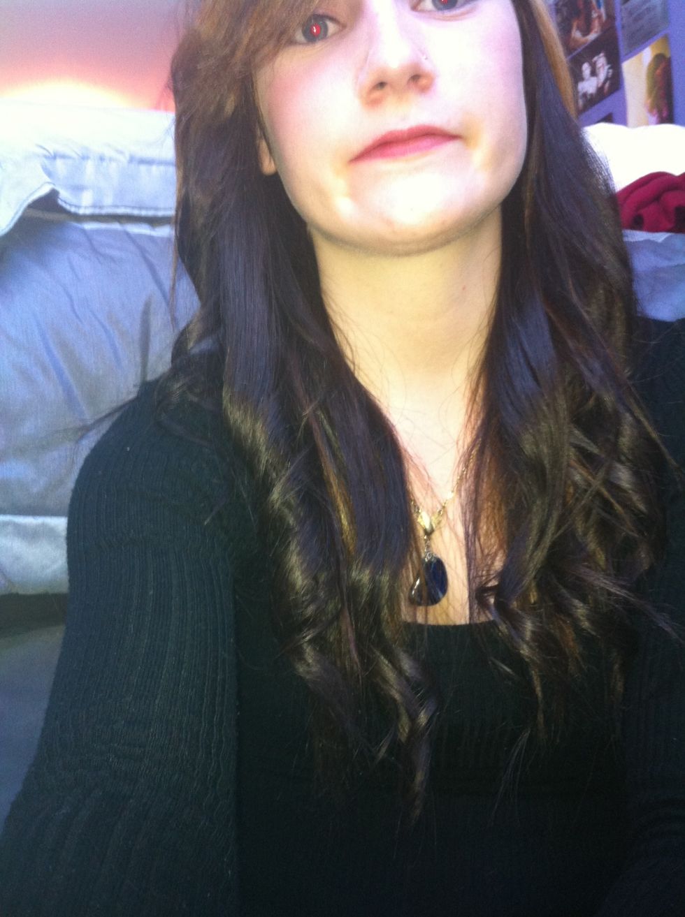 Clip back teased section, then add some curls