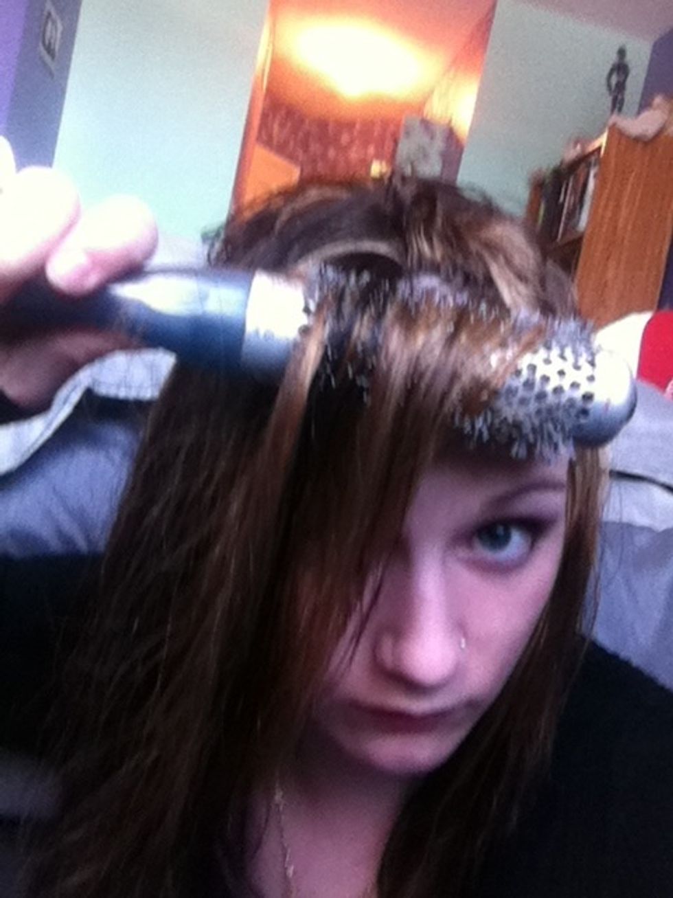 Clip the top layer in sections and blow dry section by section