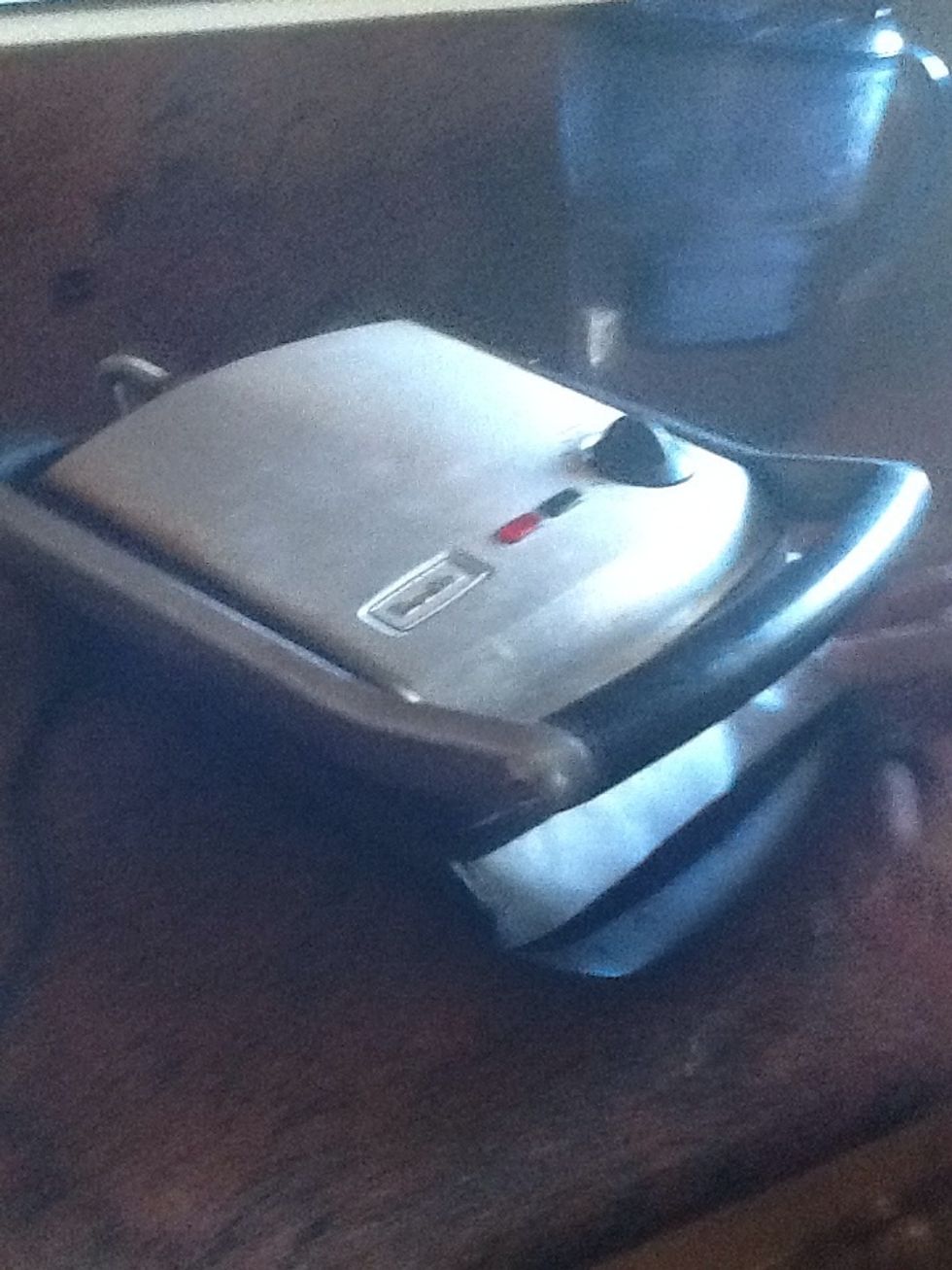 Close grill and allow it to begin cooking