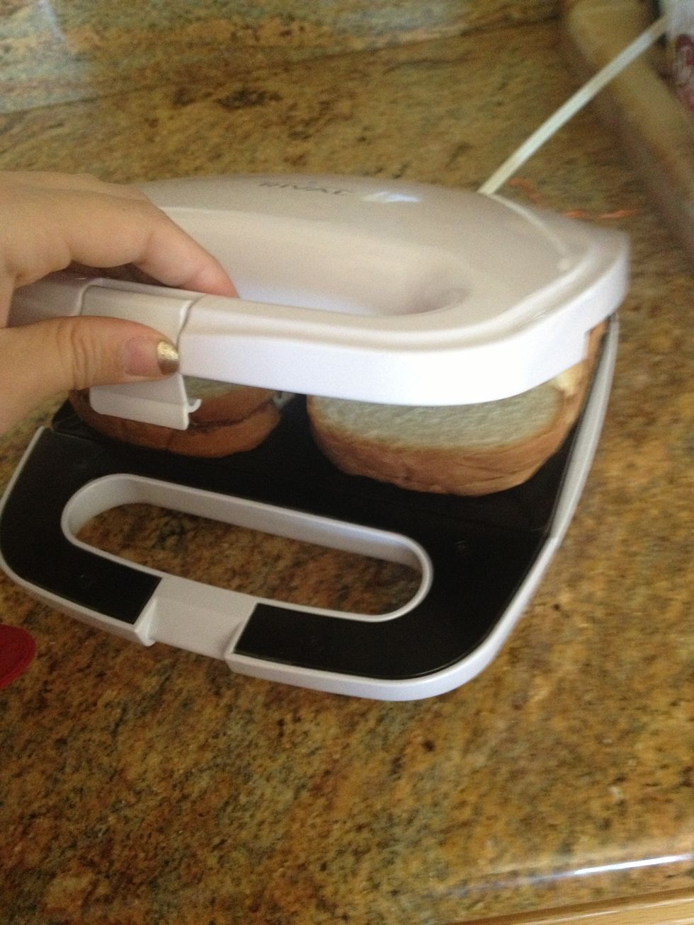 close it and don't be scared to push down, thats how it shapes the bread