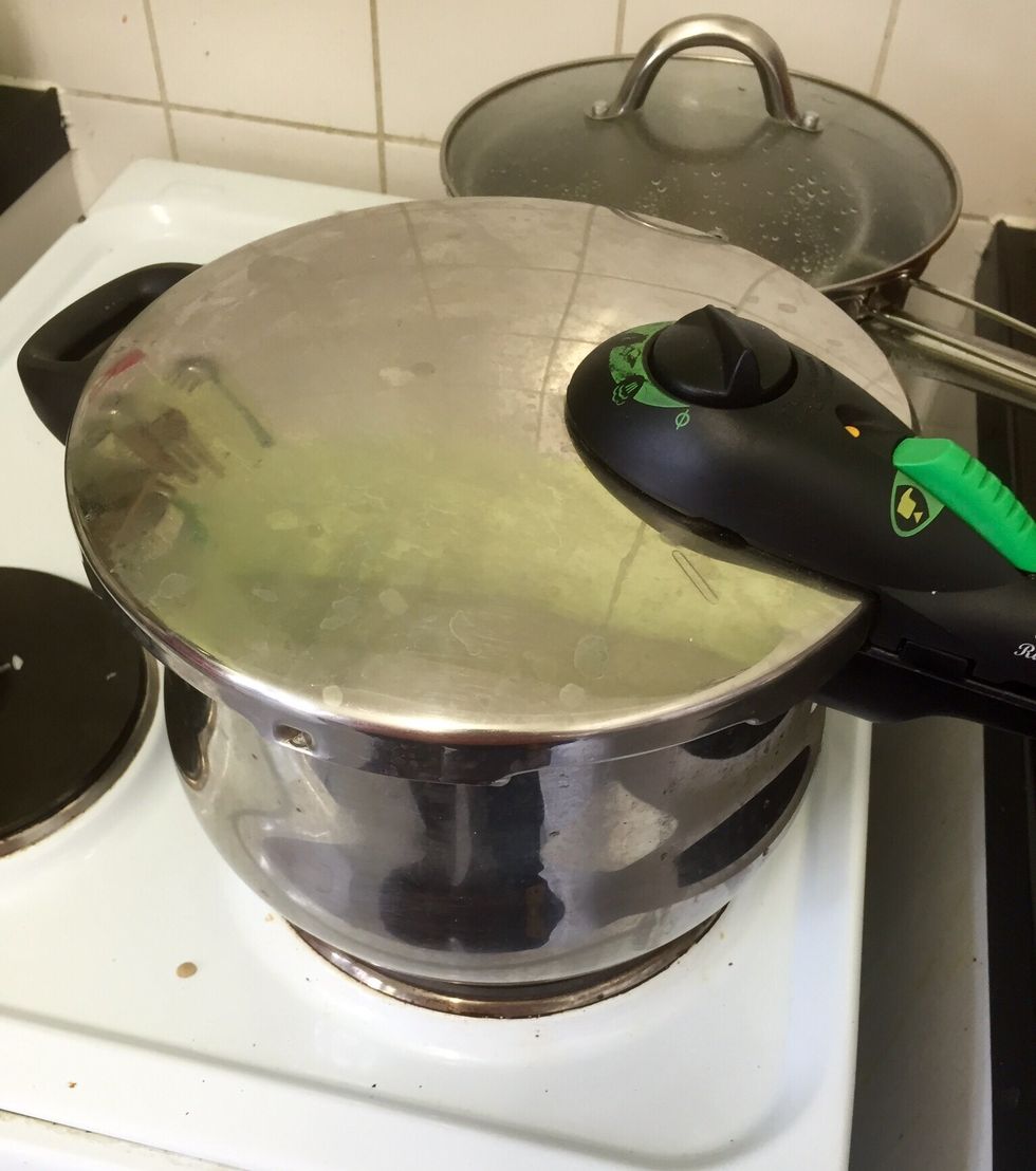 Close it and when it starts whistling, time 12 minutes. Then open it as per your pan's instructions. If you just have a normal one you will have to cook everything until the lentils are soft