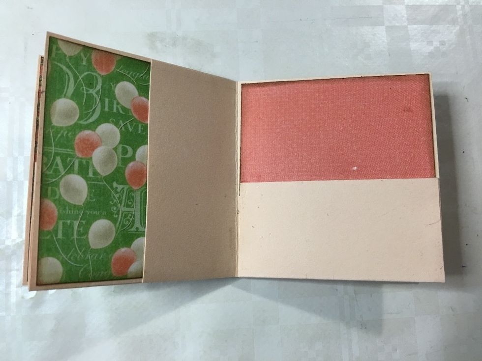 Close the bottom pocket and gently press until the glue sets.