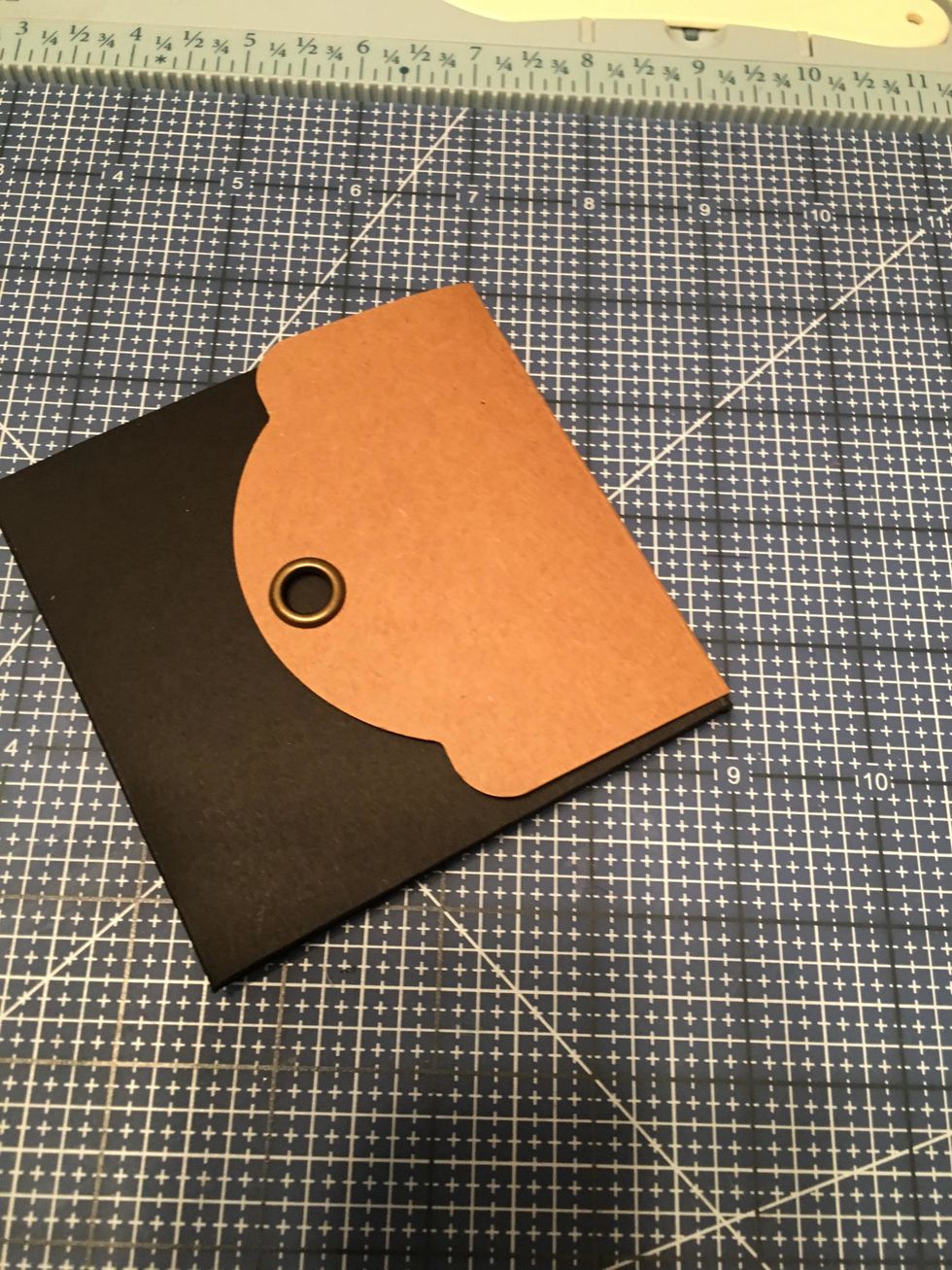 Close the flap shut and rub with your fingers over where the magnets are. Then gently open the flap, separating the magnets from each other.