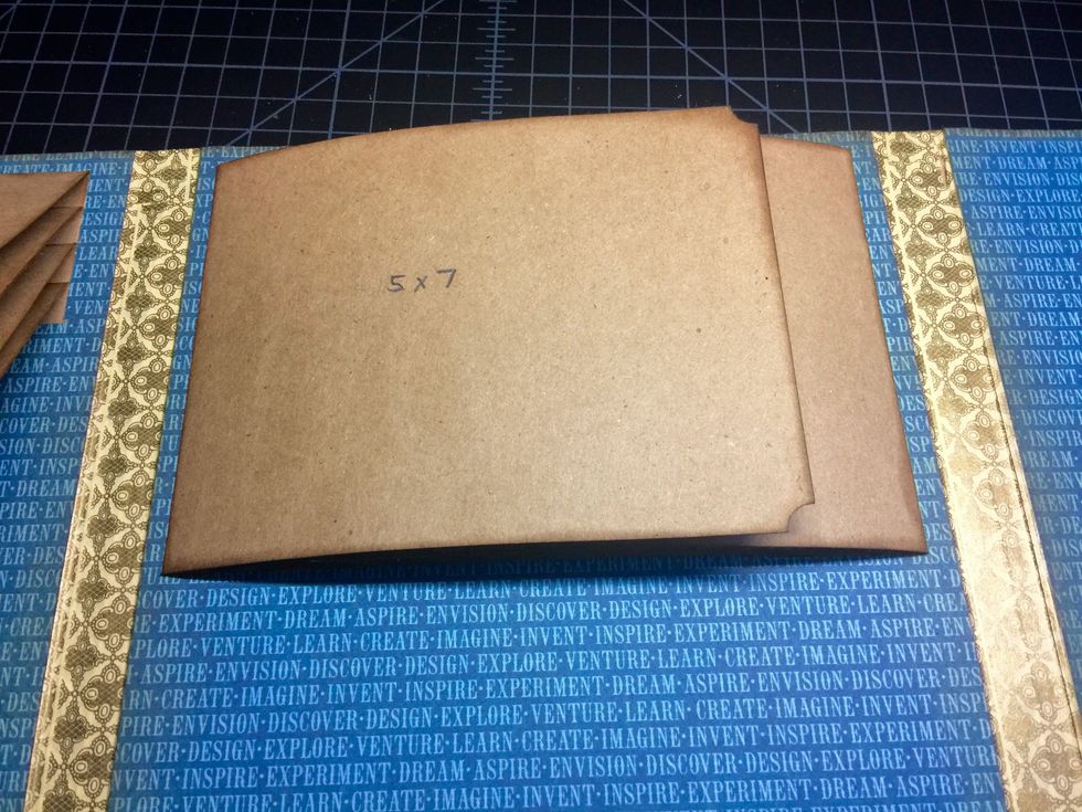 Close the flaps by alternating -- left, right, left right, etc. This is how it should look closed. Now let's add the bottom flaps and wrap things up for the base of this photo portfolio...