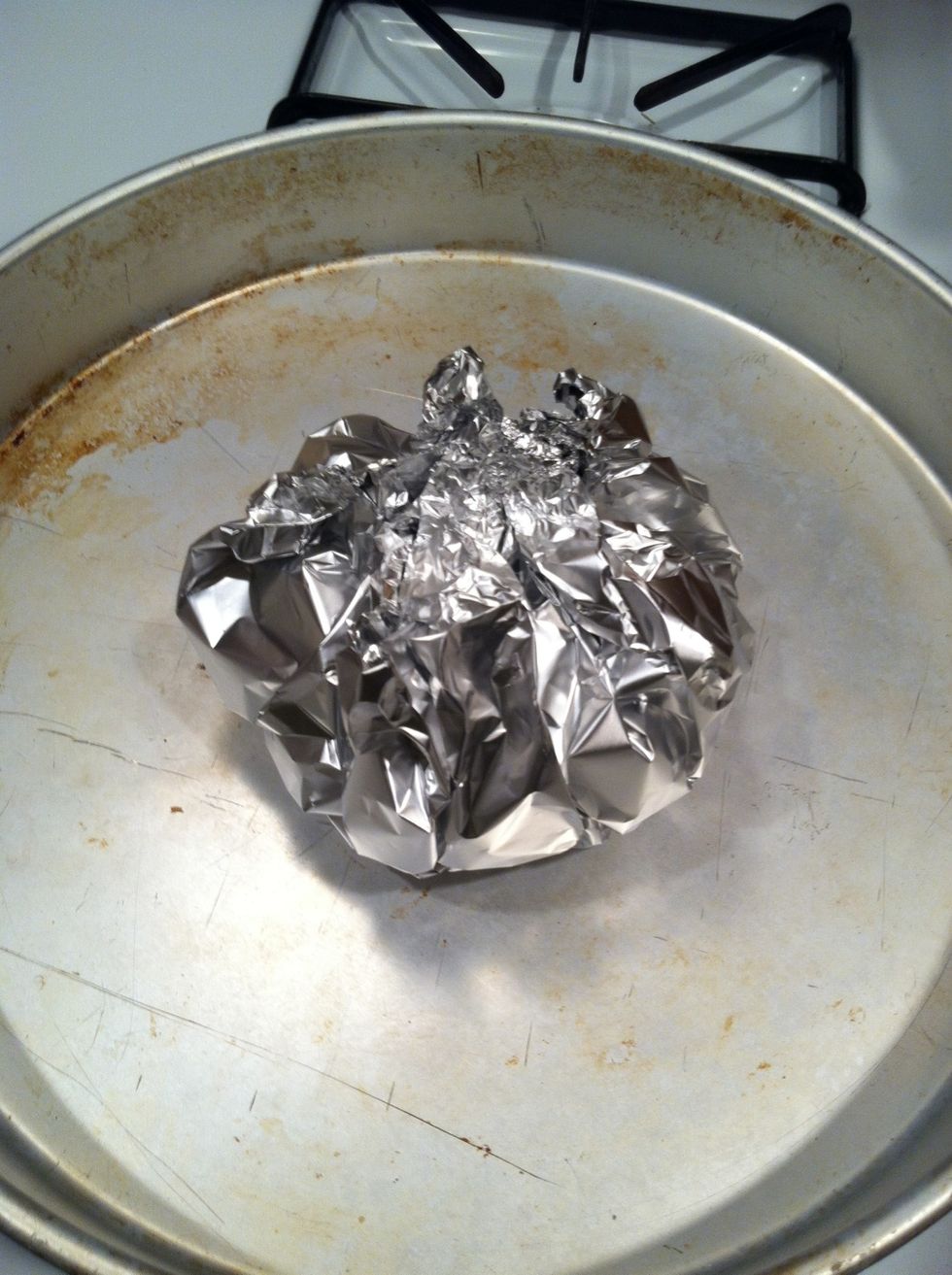 Close the foil around the onion and secure the top.
