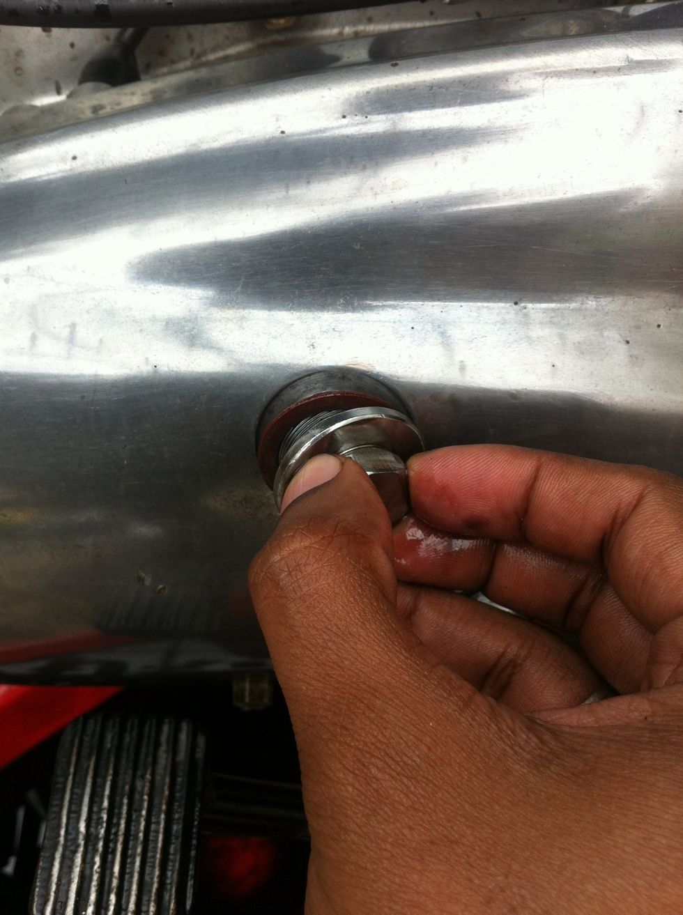 Close the inspection hole, do not forget the copper colored gasket