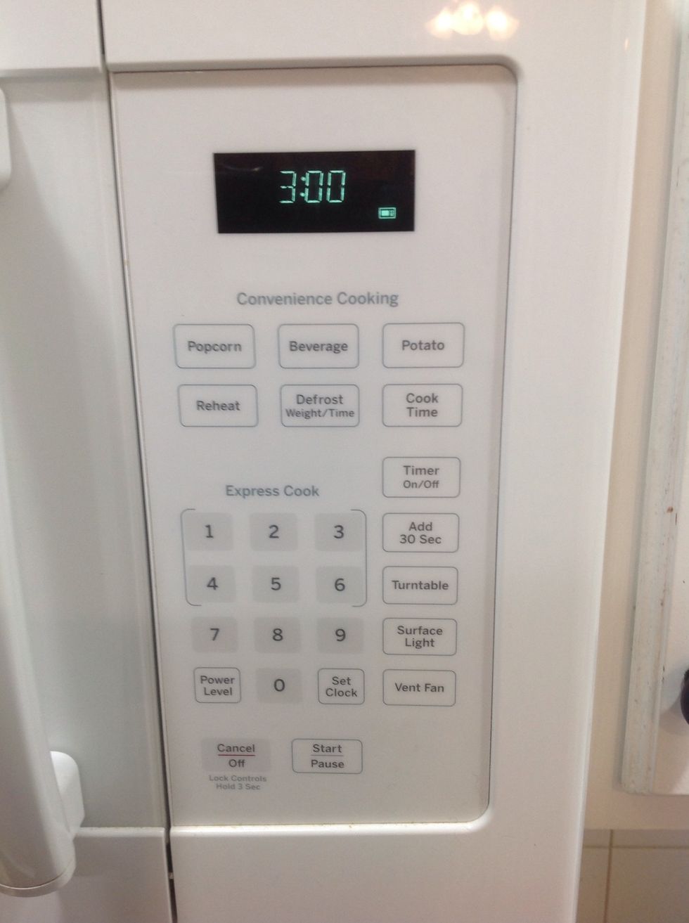 Close the lid of the waffle iron and set a timer for 3 minutes.