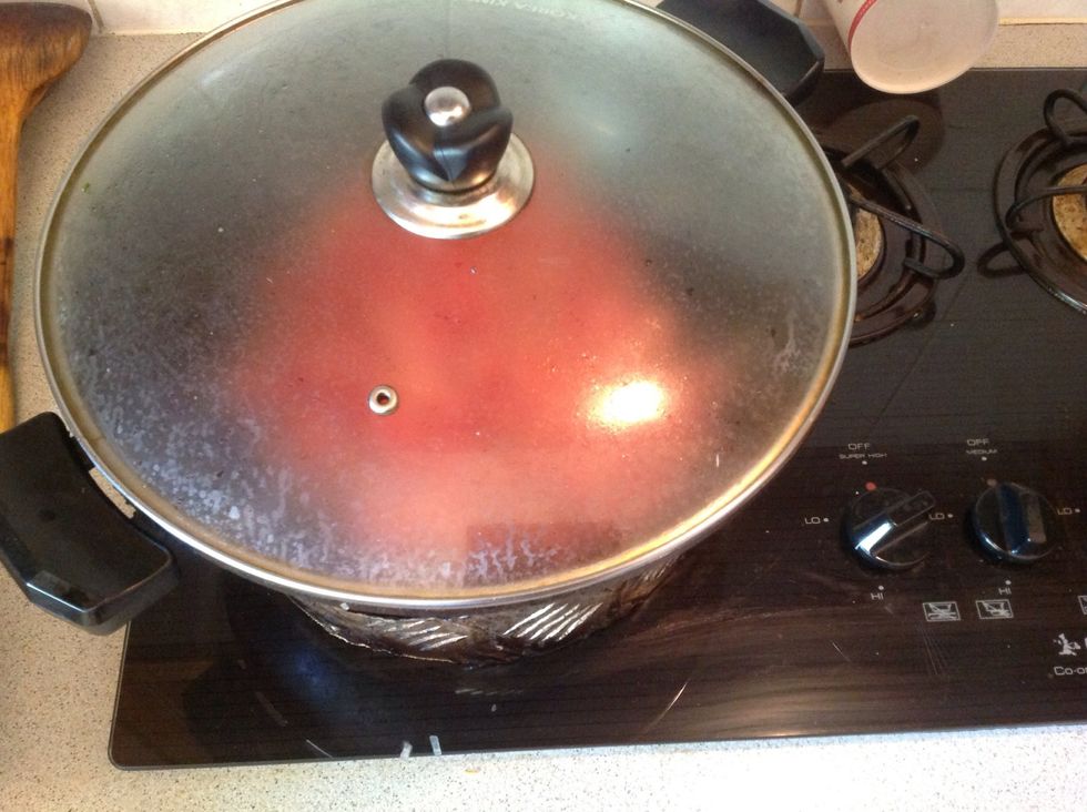 Close the lid, turn the flames to medium And let it bubble for a while