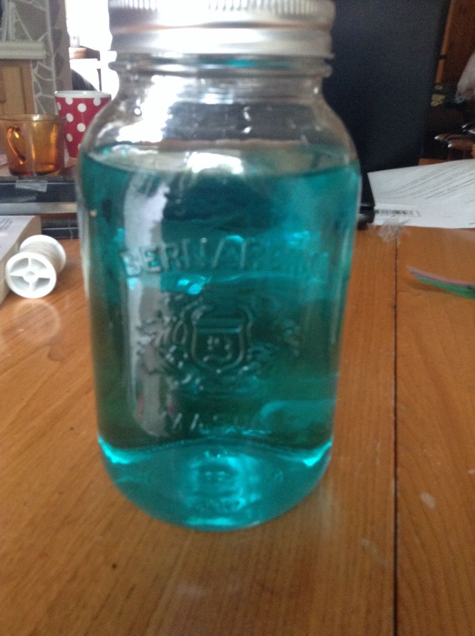 Close the mason far and shake it so the color will spread all over