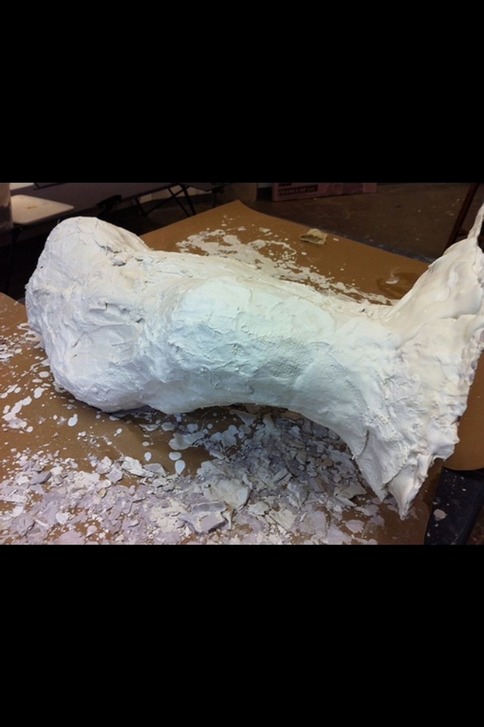 Close the mold and plaster the seams closed with plaster and burlap.