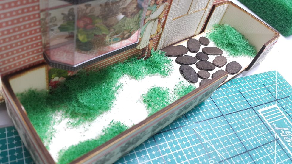 Close up for the garden with the stones and grass.