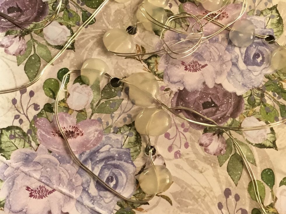 Close up of lights (off) glued into place.