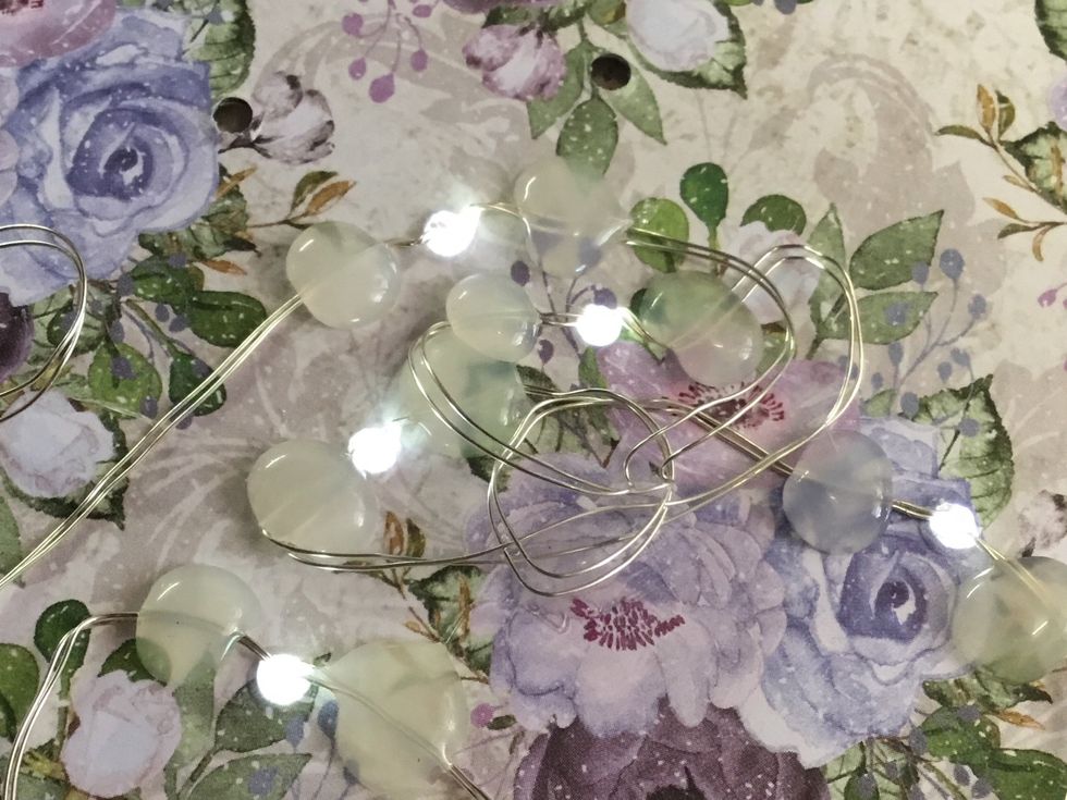 Close up of lights (on) glued into place.