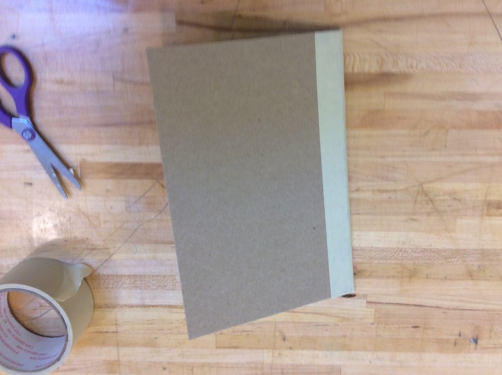 Close your book.  Now that you've attached the inside booklet to the cover, we can finish the front and back cover.
