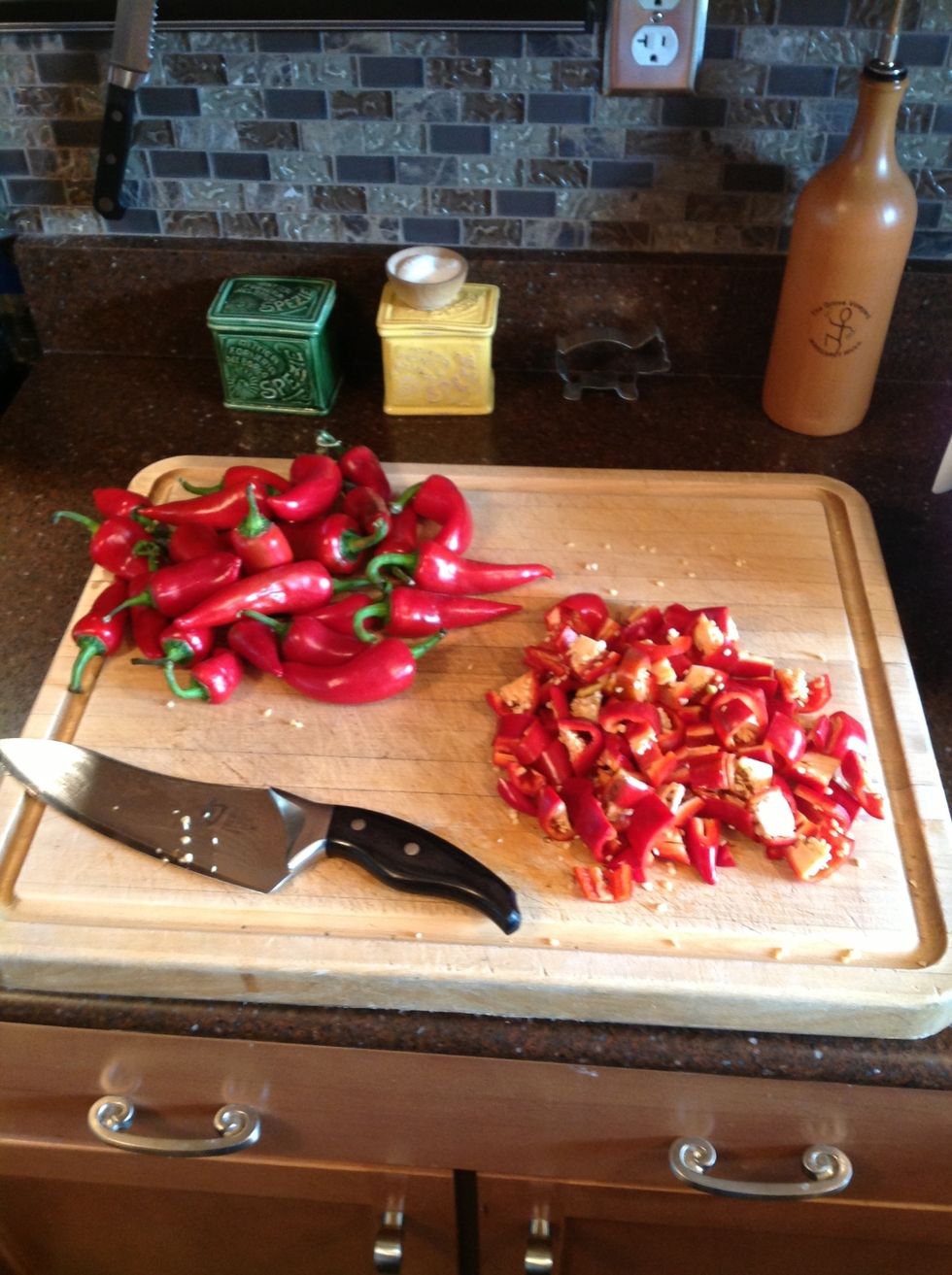Coarsely chop the Fresno Chiles, leave the seeds in.