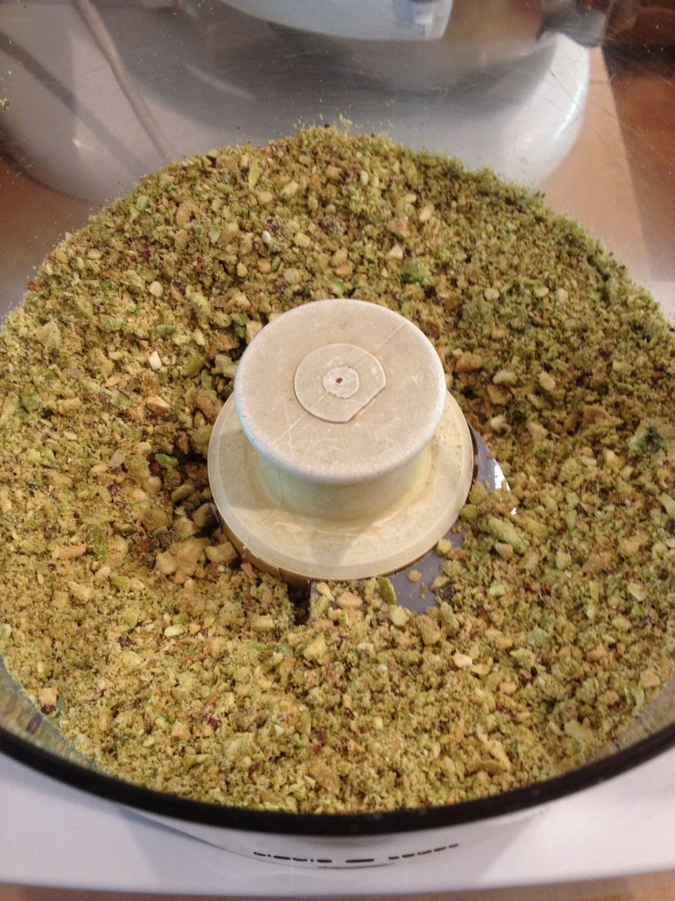 Coarsely grind. Remove from the Cuisinart and put aside.