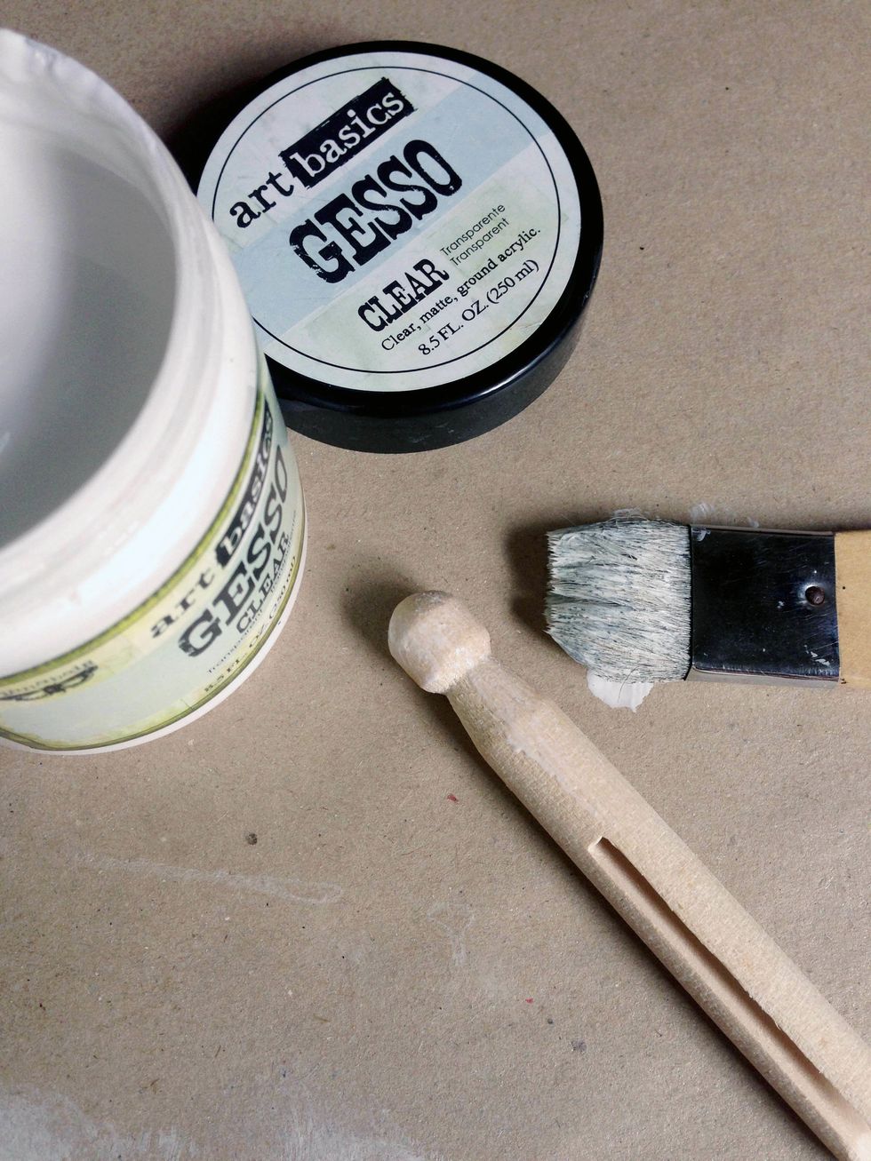 Coat a layer of clear gesso onto the clothespin pegs... This is to prime the surfaces...