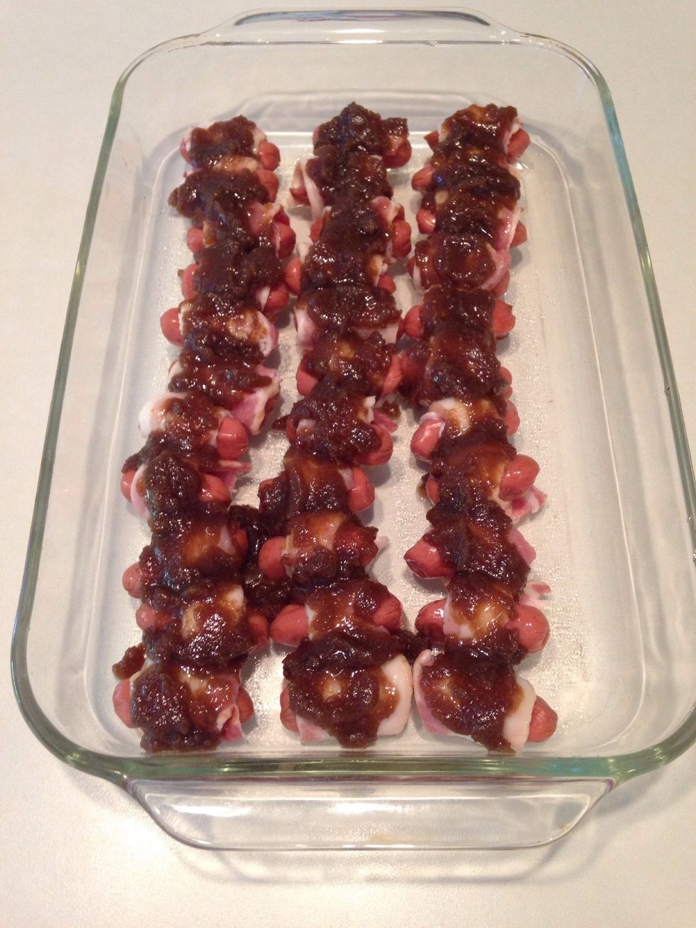 Coat bacon wrapped smokies with mixture.