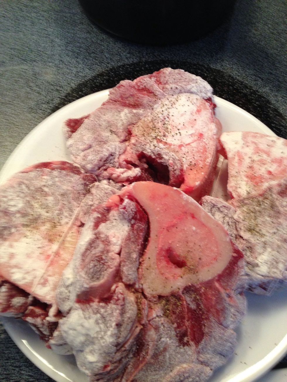 Coat beef shanks with flour and salt/pepper