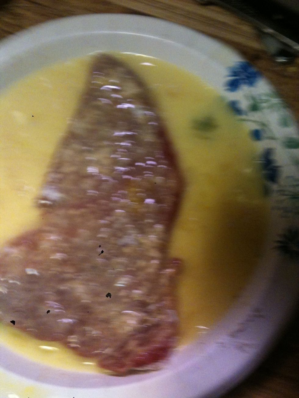 Coat both sides in egg mixture and let the excess egg drip off if any does drip