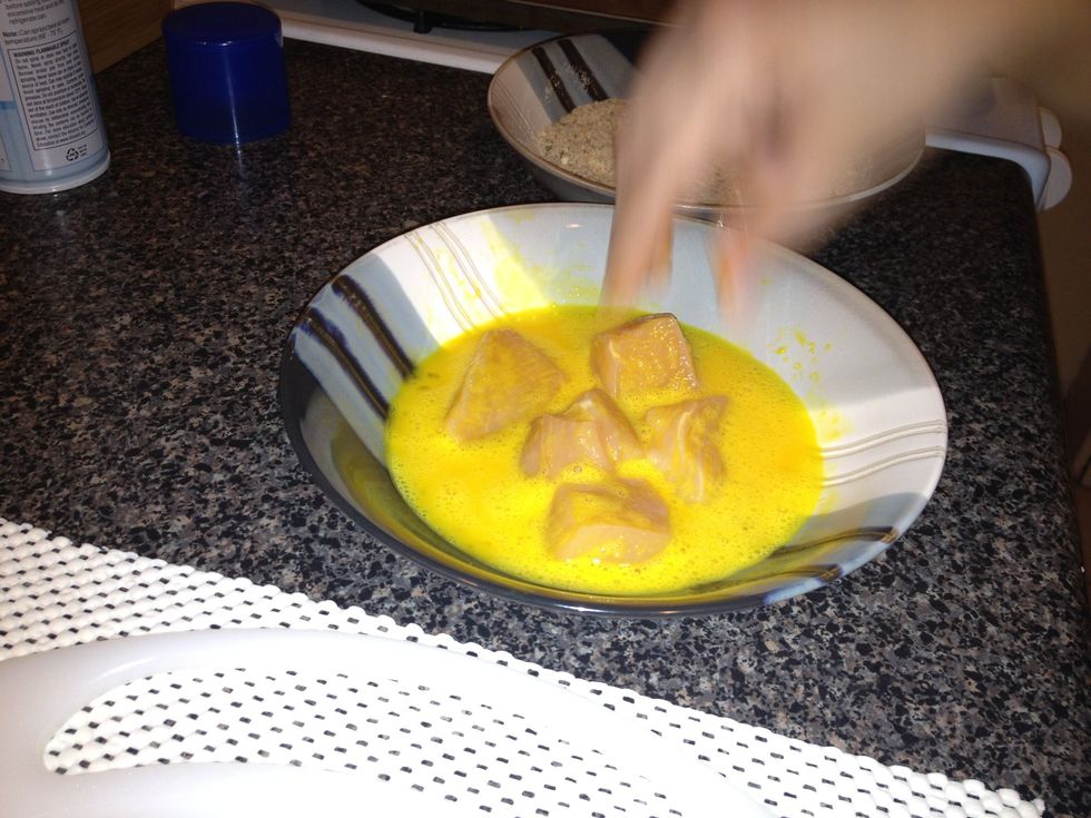 Coat chicken in egg.
