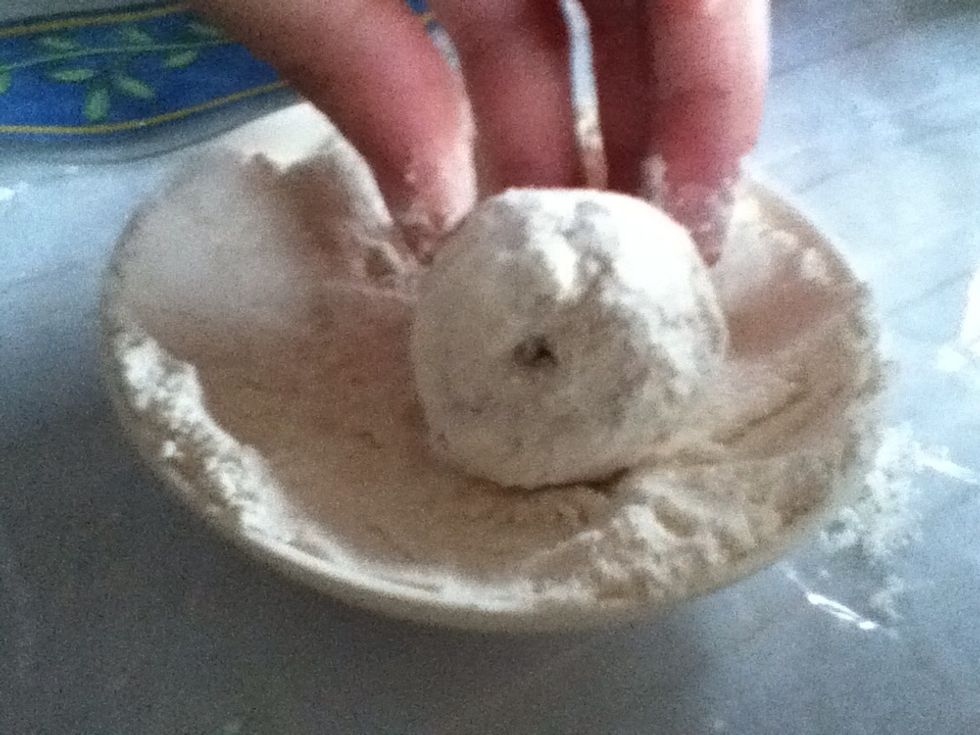 Coat each piece  with flour one by one.