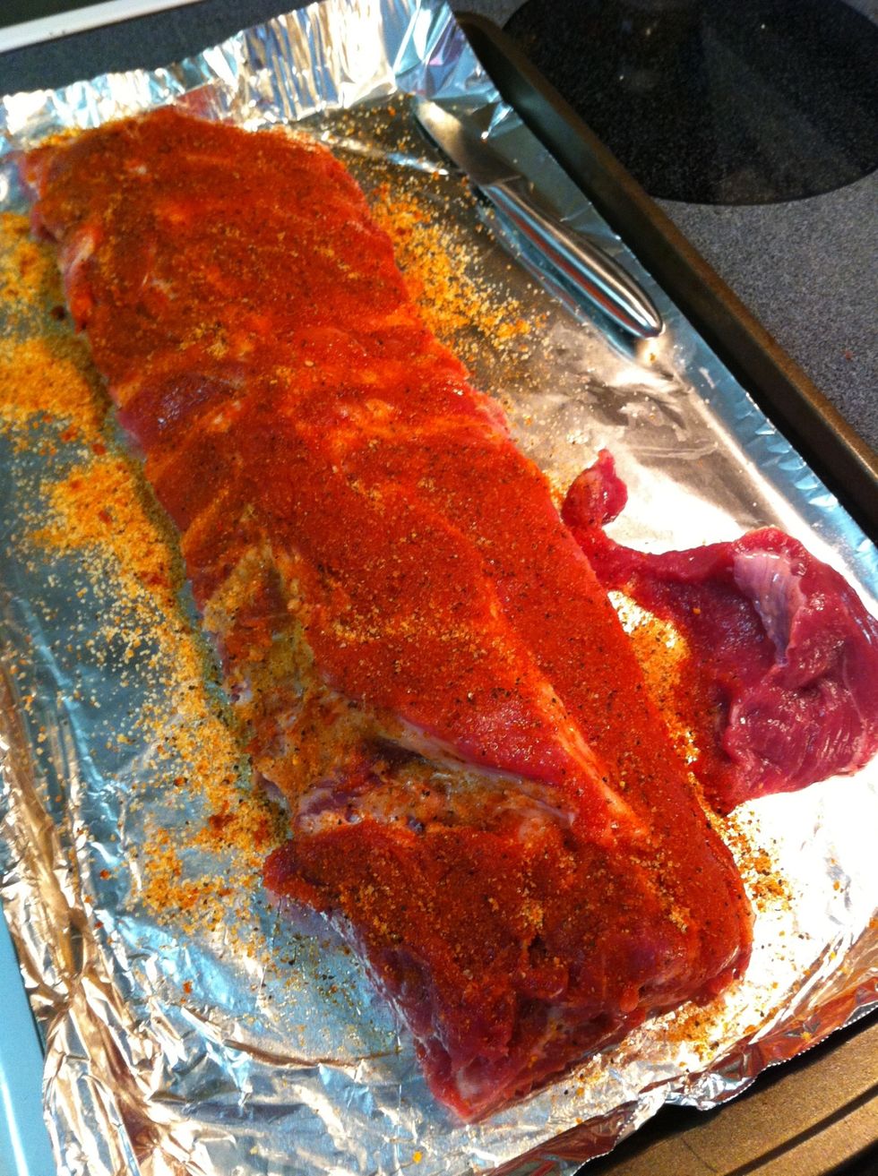 Coat front and back evenly. Once finished, you can place in fridge for 8 hours, overnight, or go straight to the grill. However you choose, your ribs are now ready for some smoke.